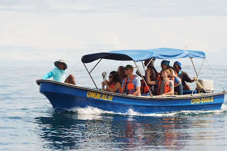 Guests traveling to the lodge by boat